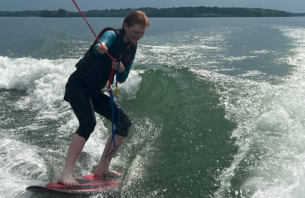 Learning to surf with Greenflash Watersports Summer Camp