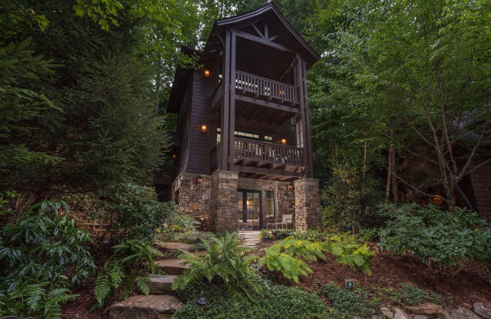 exterior photo of two story tiny luxury home in the woods  Greybeard Vacation Rentals