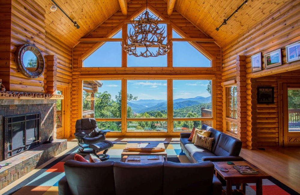 full wall of windows with a view in modern luxury cabin Greybeard Vacation Rentals