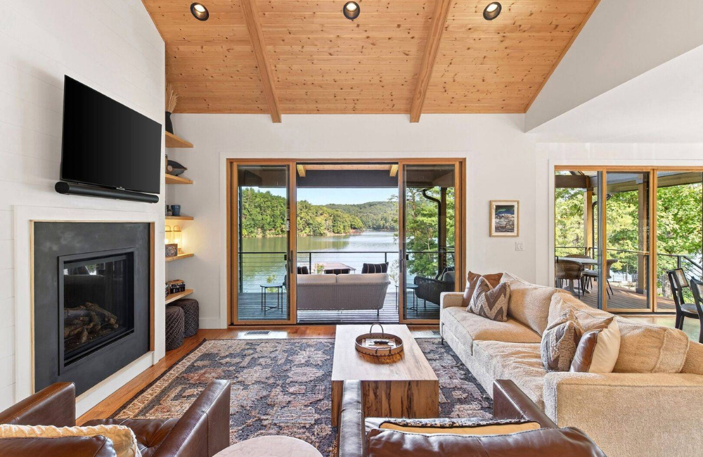 spacious wood and white walls luxury living room Greybeard Vacation Rentals