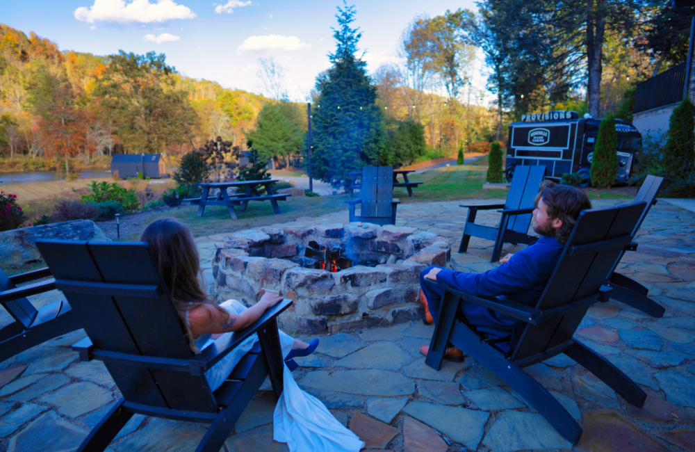 Asheville-River-Cabins-wedded-couple-at-firepit