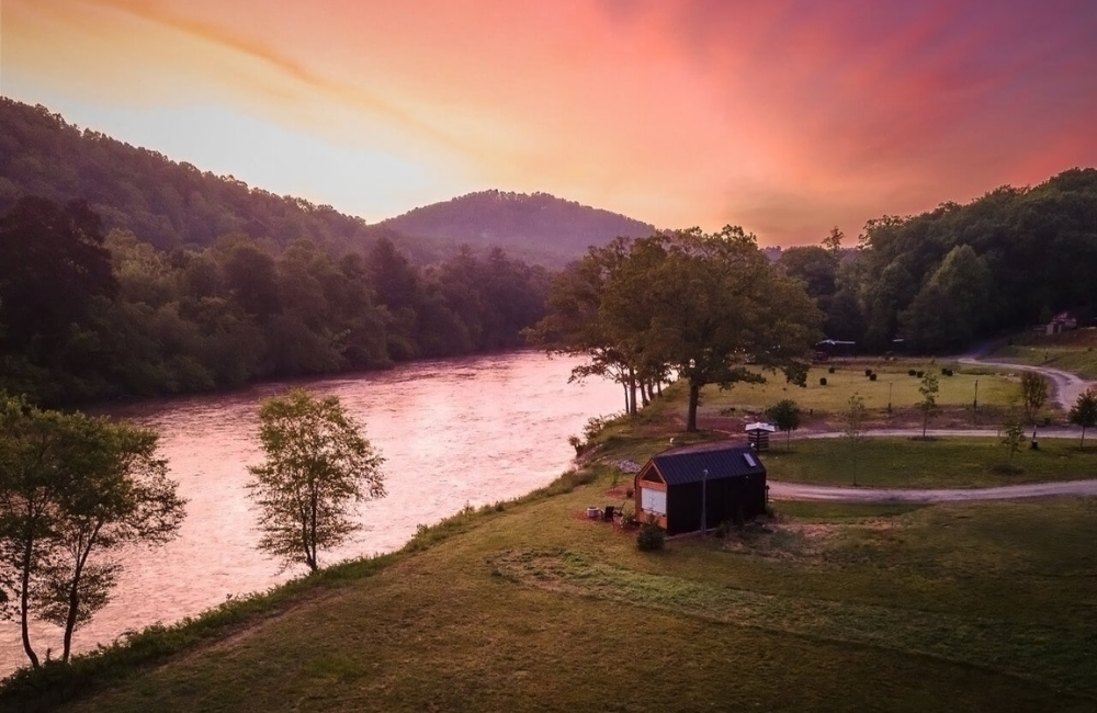 Asheville River Cabins river at sunset