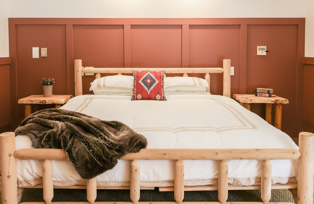 King size bed at Outland Great Smoky Mountains Chalet & Suites
