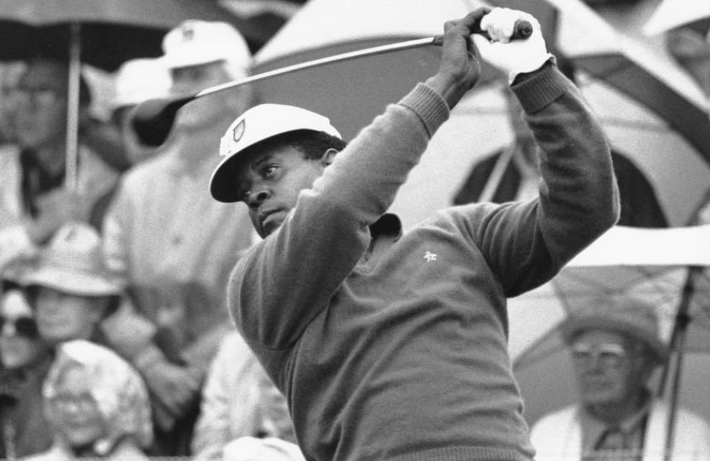 Historic photo of man swinging at Skyview Golf Tournament