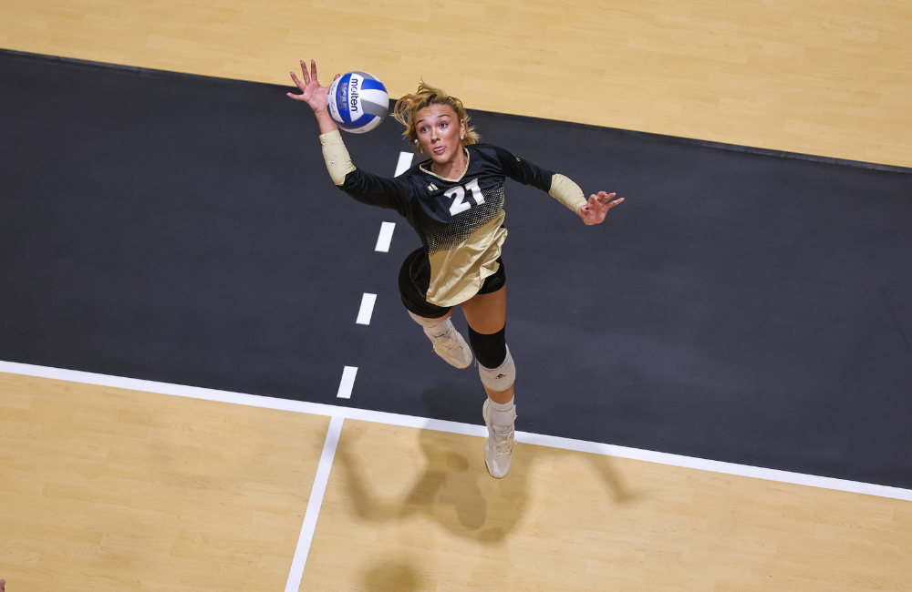 Woman preparing to strike a volleyball
