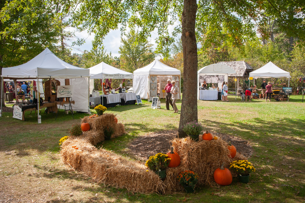 artist tents at an outdoor festival