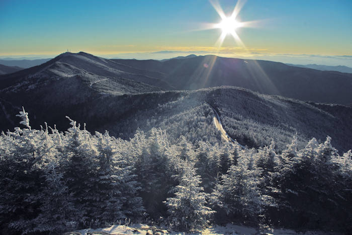 Sun over the winter mountains