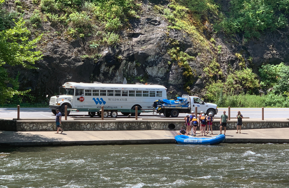 Buses transport rafters to the put in spots