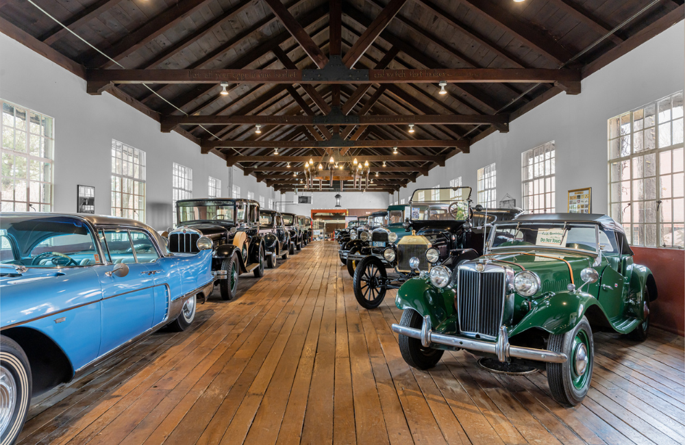 Room full of antique cars at Estes-Winn Antique Museum