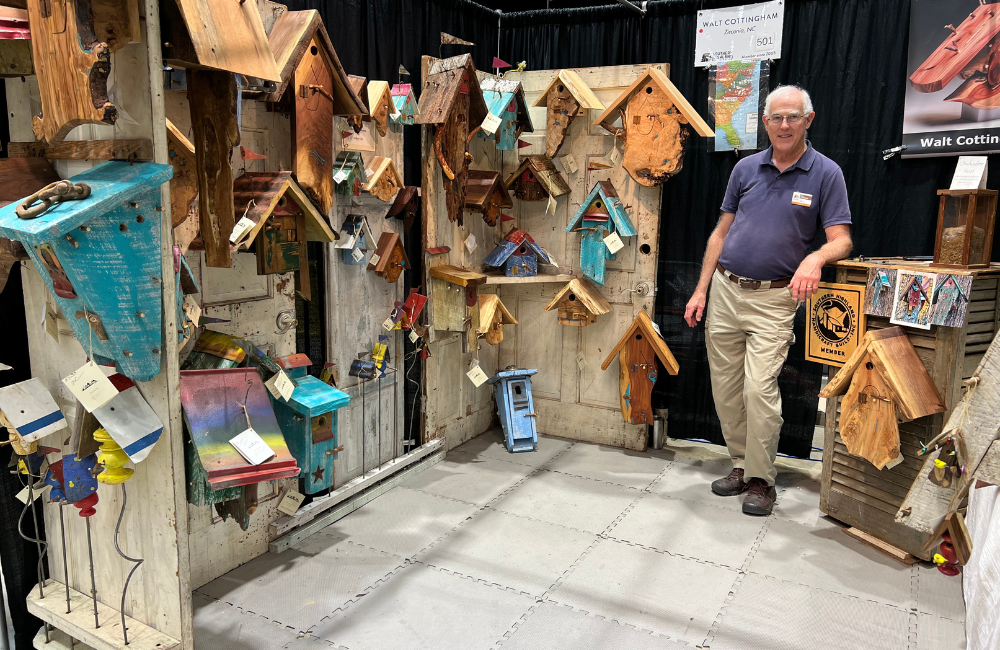 A mini pop up juried art booth at the Folk Art Center
