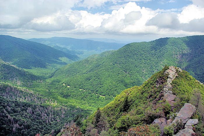 View of green mountains for miles on a summer day