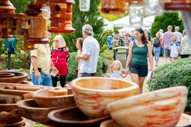 Closeup of handcrafted wooden bowls at an arts and crafts festival