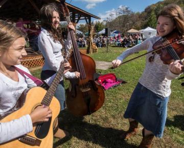 Musicians playing mountain music at Harvest Festival.